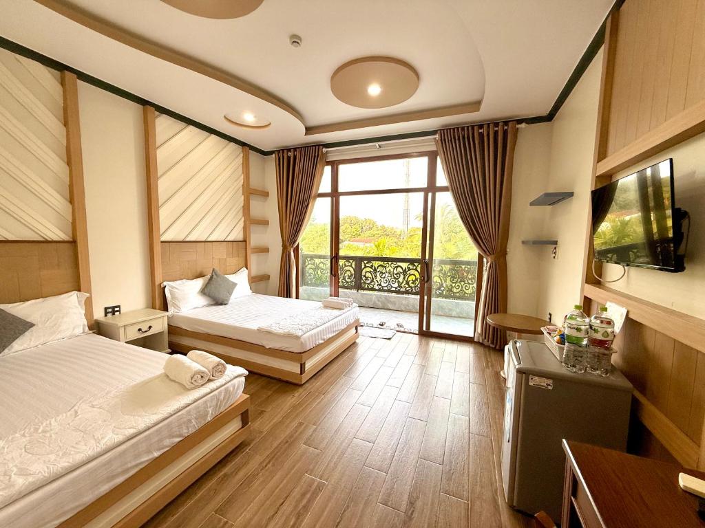 Giường trong phòng chung tại Gia An Hung Guest House