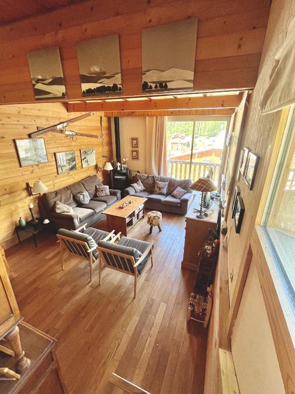 an overhead view of a living room in a cabin at Les Pounchus D N02 - 3P8 in La Foux d'Allos