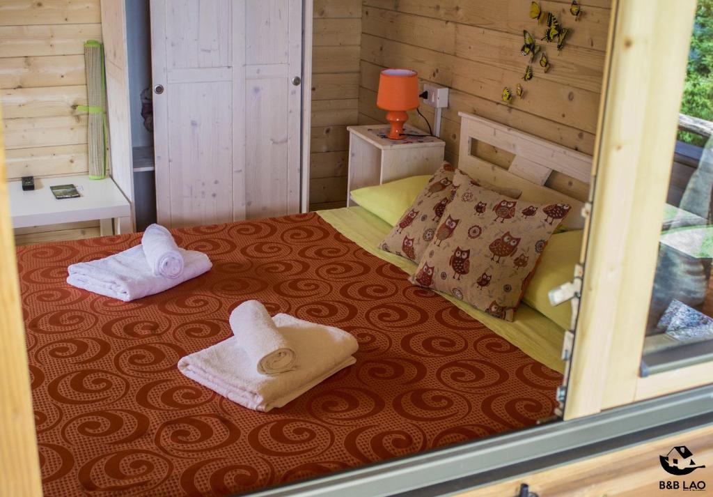 Postel nebo postele na pokoji v ubytování B&B Lao