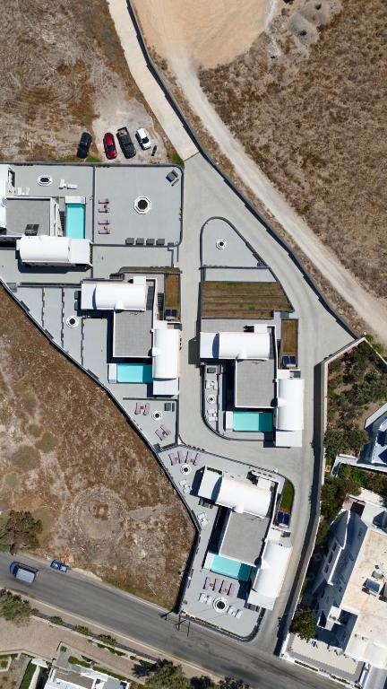 an overhead view of a building with a road at Akron Ariston Suites in Akrotiri
