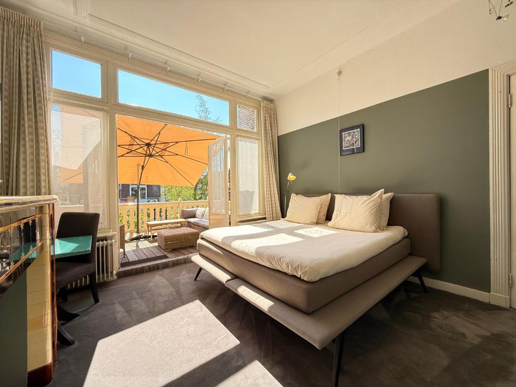 Ένα ή περισσότερα κρεβάτια σε δωμάτιο στο Juliana boutique guestrooms