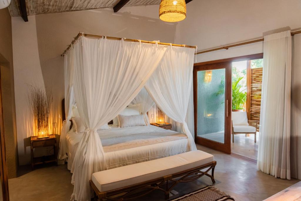 Una cama o camas en una habitación de Aketá Hotel Boutique