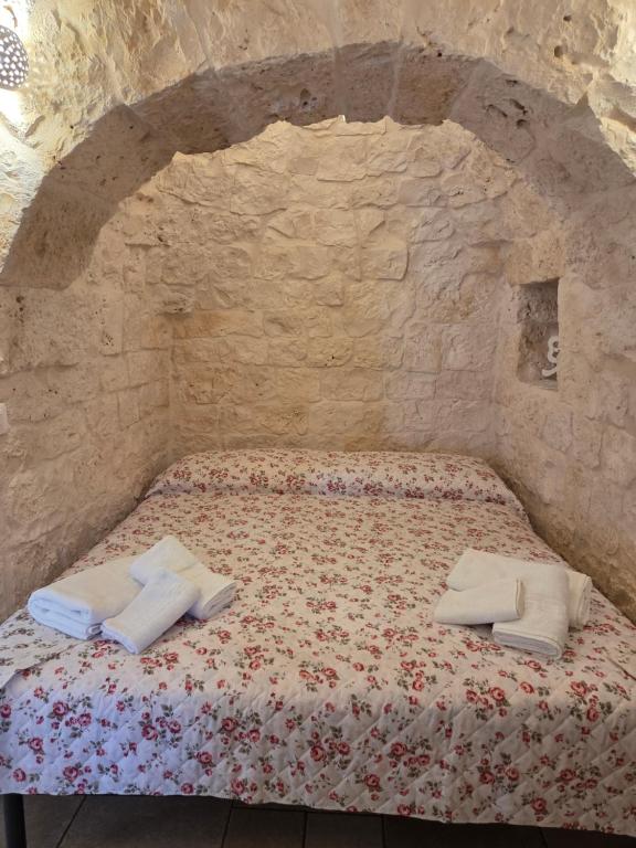 Ένα ή περισσότερα κρεβάτια σε δωμάτιο στο Beltrullo Pietrevive