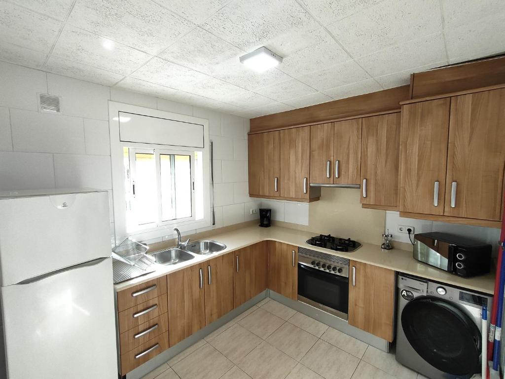 Η κουζίνα ή μικρή κουζίνα στο Apartaments Lamoga - Sandi