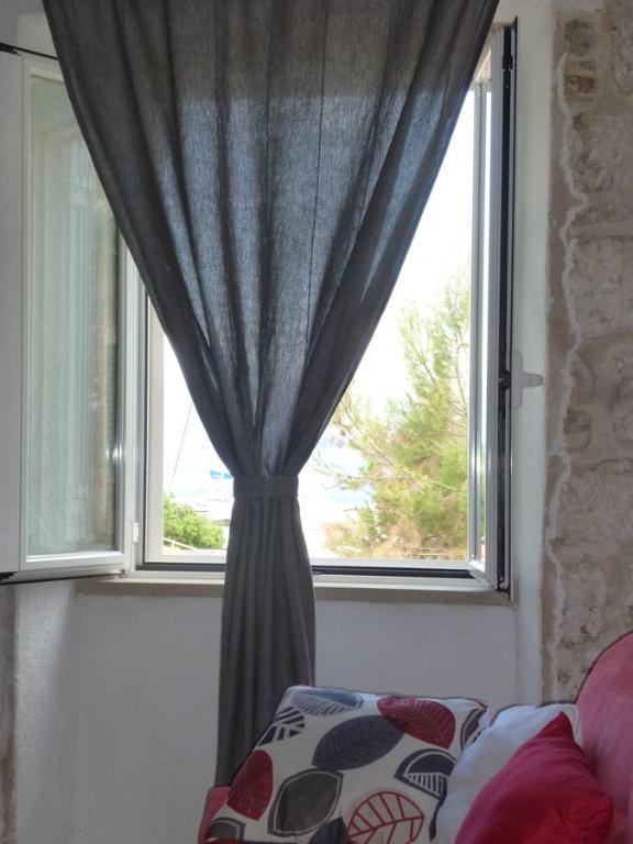 Łóżko lub łóżka w pokoju w obiekcie Apartment Sunrise