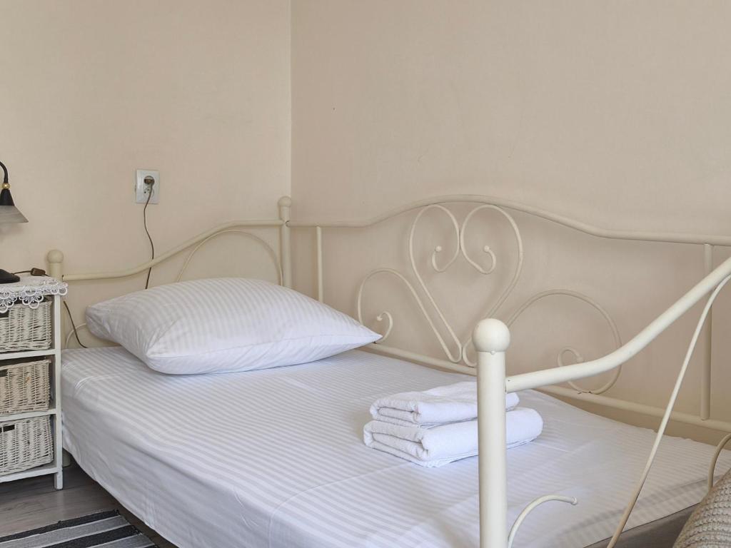 Ένα ή περισσότερα κρεβάτια σε δωμάτιο στο Sleepy3city Batorego 20