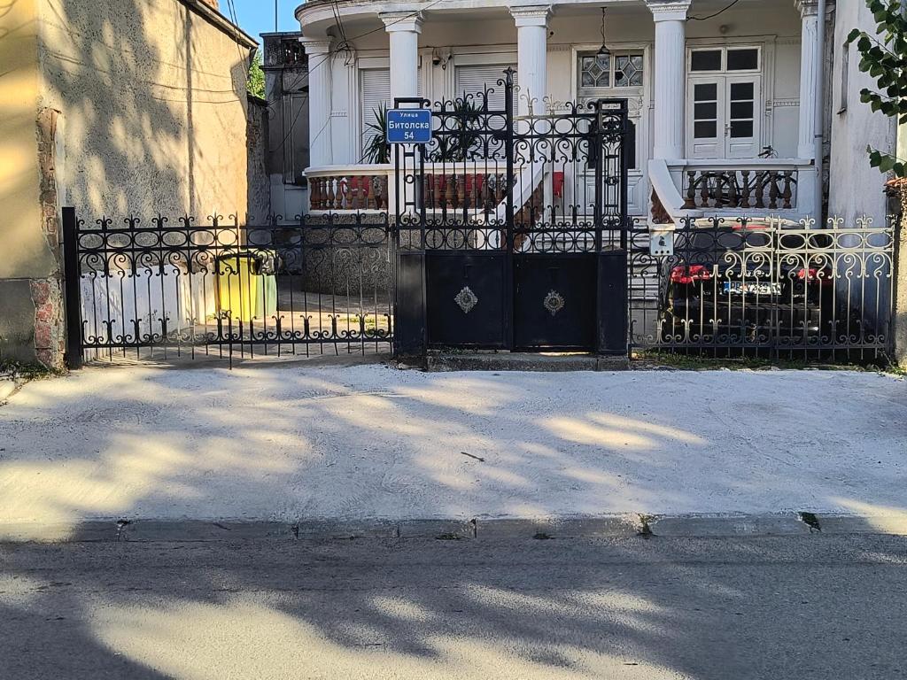 a wrought iron gate in front of a house at Guest House Prilep in Prilep