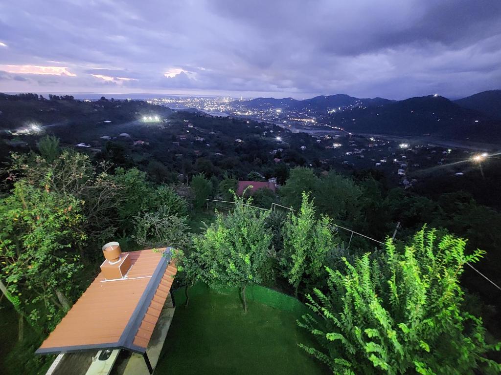 a wooden bench sitting on top of a hill at chemi kera chalet 2 in Angisa