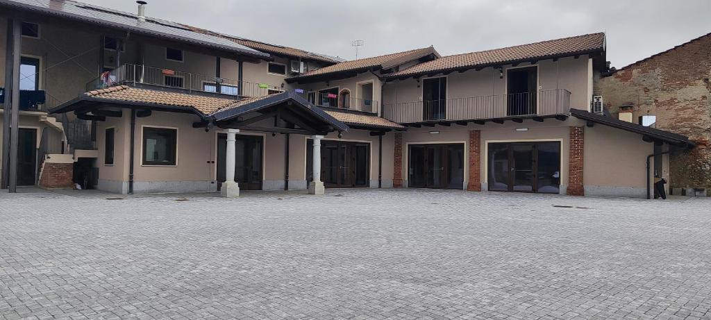 an empty parking lot in front of a building at Antica Fontana in Bernezzo