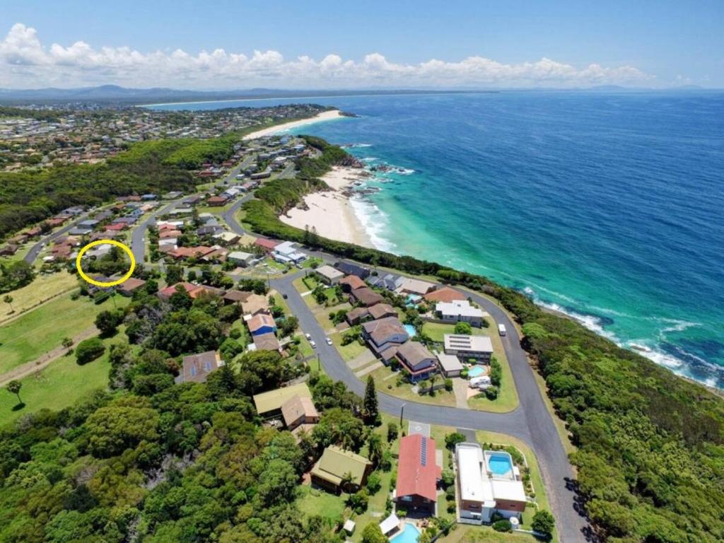 an aerial view of a beach and the ocean at Sea Salt One Burgess Beach in Forster