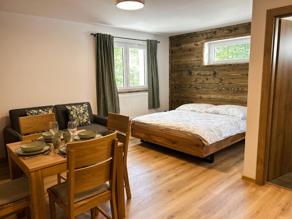 Ένα ή περισσότερα κρεβάτια σε δωμάτιο στο Apartmán Sachrák Harrachov