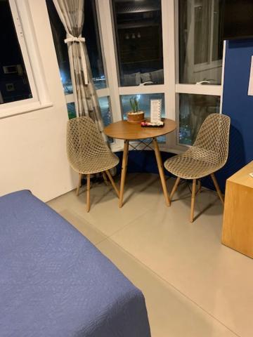 Χώρος καθιστικού στο suite deluxe vista mar Copacabana - entrada independente