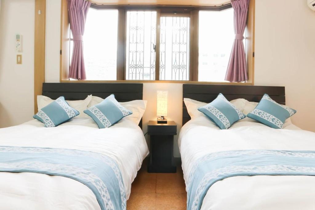 Postel nebo postele na pokoji v ubytování Maison Tsunami - Vacation STAY 79591v