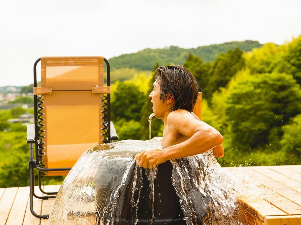 a young boy sitting in a water fountain at HOLE37 - Vacation STAY 42192v in Hōjō