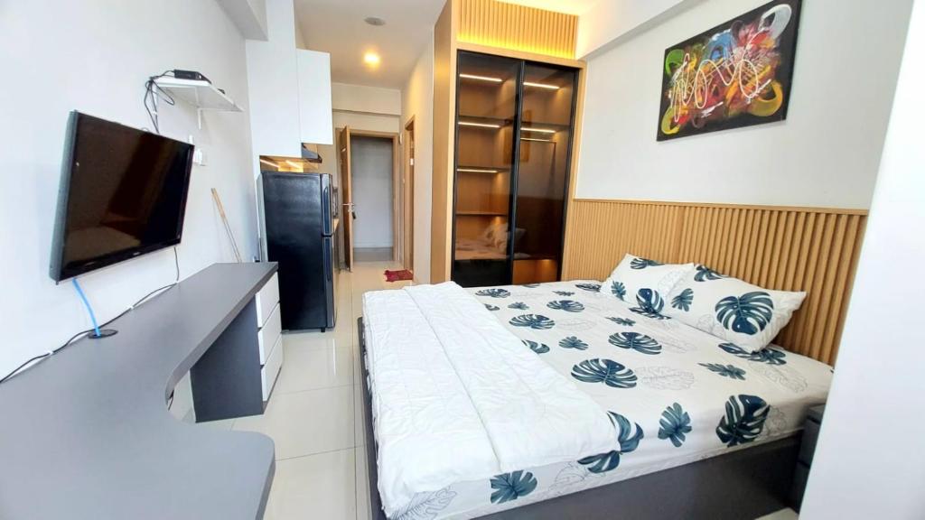 Postel nebo postele na pokoji v ubytování Baloi Apartement