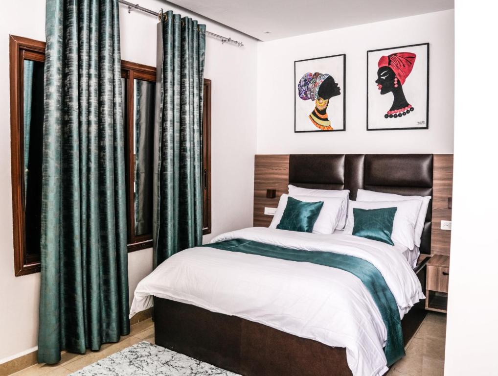 Una cama o camas en una habitación de Borelie Guest House
