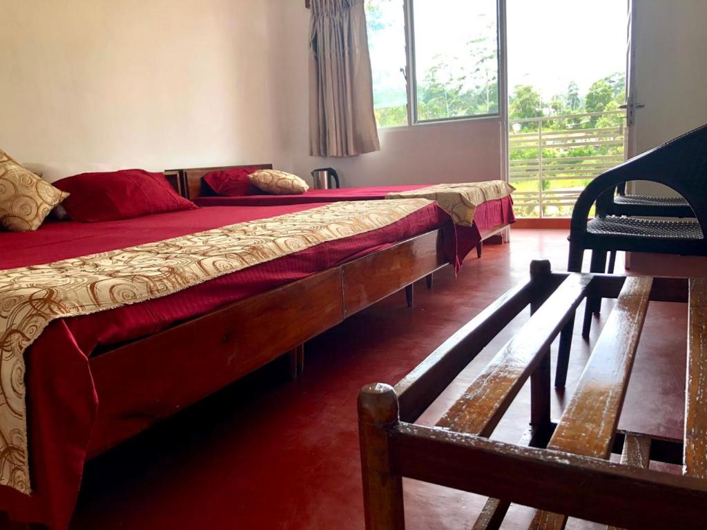Ένα ή περισσότερα κρεβάτια σε δωμάτιο στο Seasons Homestay