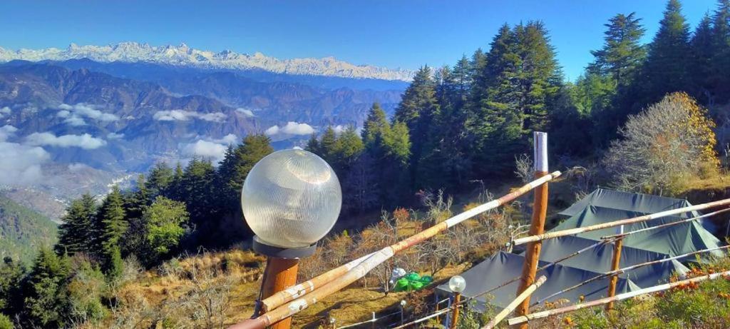 a street light on the side of a mountain at Kanatal Majestic Resort by RIHS in Kanatal