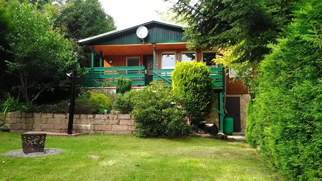 Κήπος έξω από το Ferienhaus Eichhörnchen