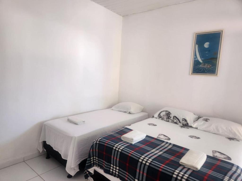 Postel nebo postele na pokoji v ubytování Pousada Estrela Mar - Próximo ao Mangue Seco
