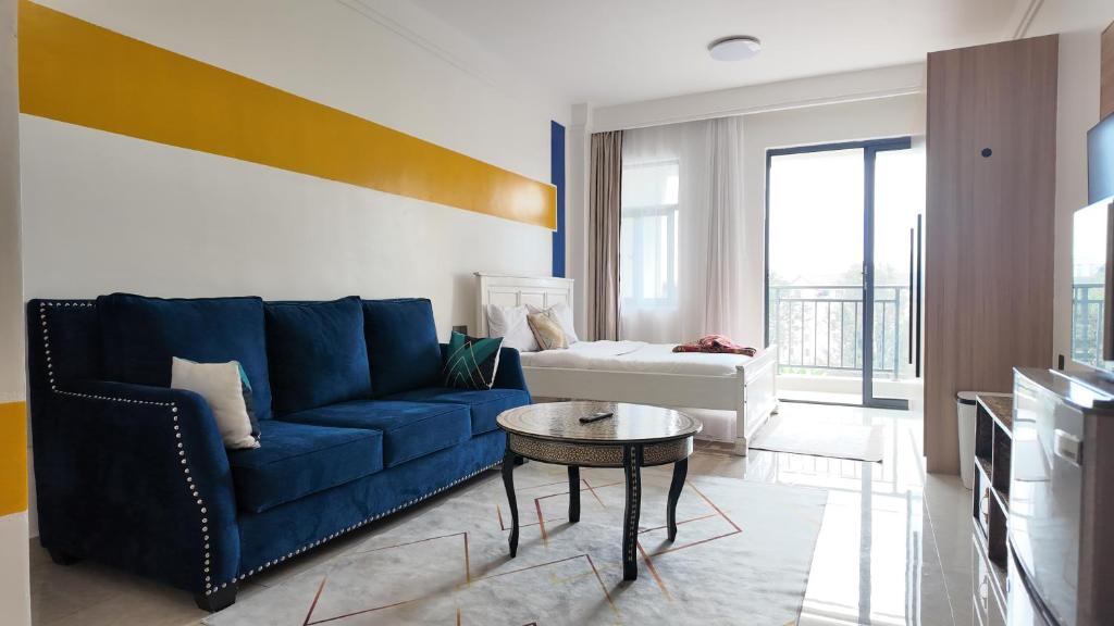 Posezení v ubytování Ruaka studio apartment with a pool