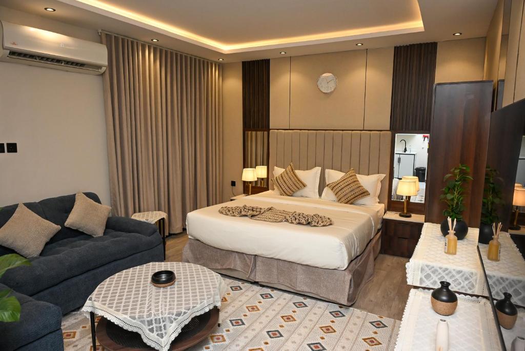 Giường trong phòng chung tại Aknan AlNarjs