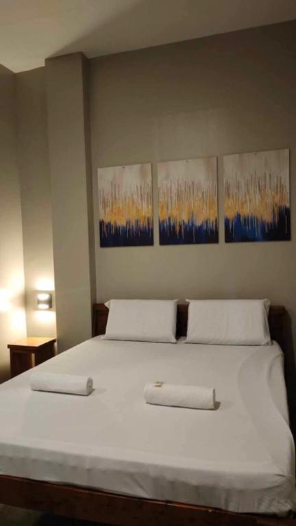 Ένα ή περισσότερα κρεβάτια σε δωμάτιο στο Wjv Inn Jugan Branch