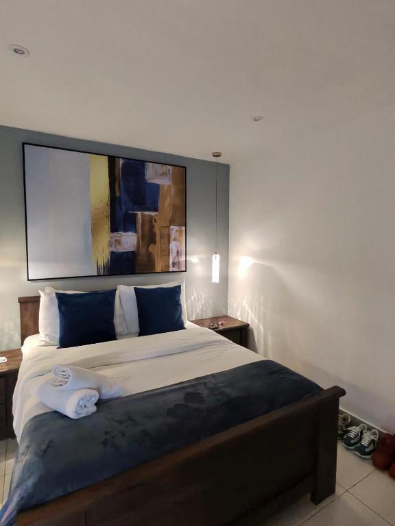 Ένα ή περισσότερα κρεβάτια σε δωμάτιο στο Chase luxury apartments at Loxwood House