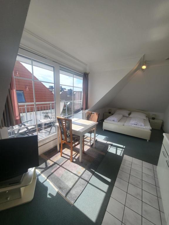 Postel nebo postele na pokoji v ubytování Komfortable Ferienwohnung in Duhnen Cuxhaven