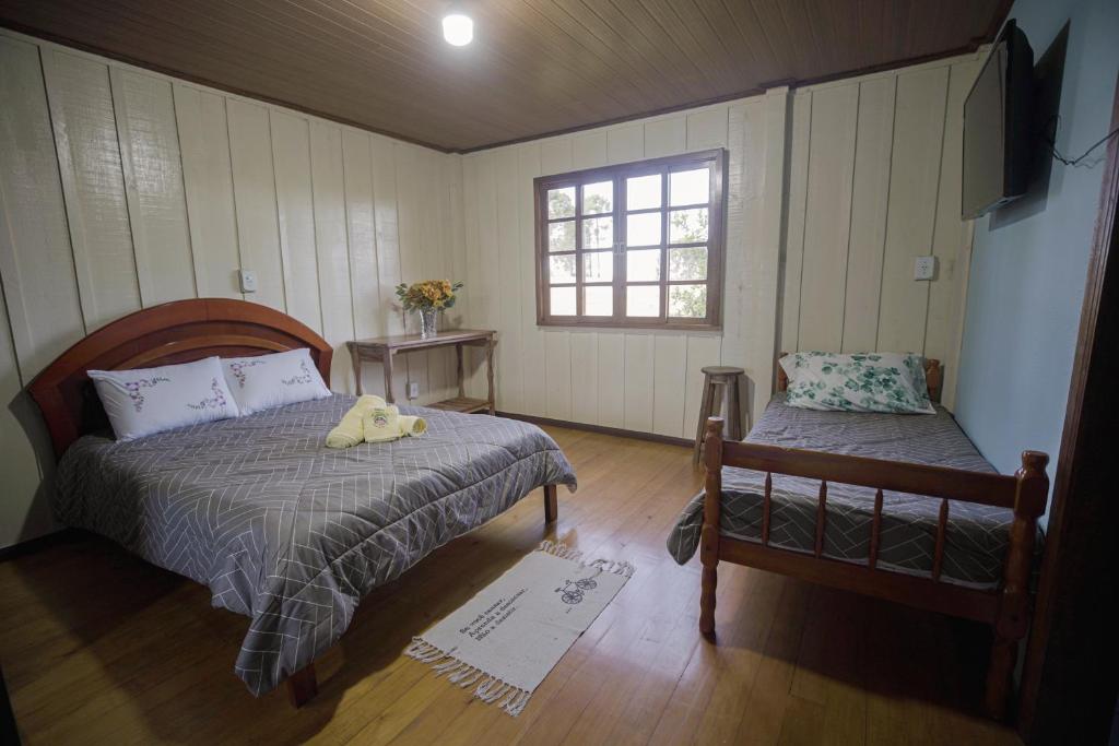 Postel nebo postele na pokoji v ubytování Pousada Sitio Campina da Casa