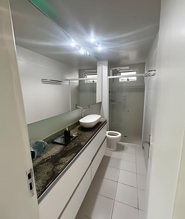 Koupelna v ubytování Estúdio próximo ao aeroporto com vaga na garagem