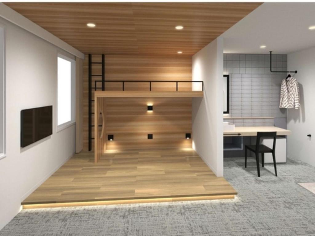Телевизор и/или развлекательный центр в K,M,H Art hotel by Kure Morisawa - Vacation STAY 23295v