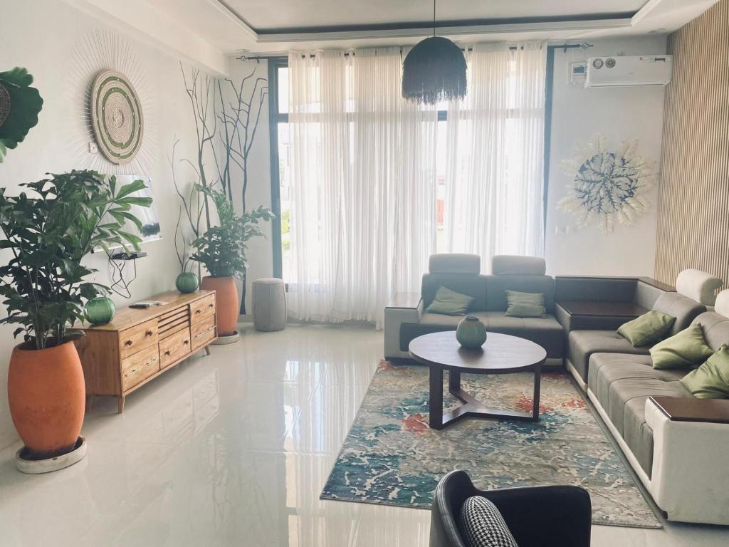 Posezení v ubytování COMFORT INN-Executive Apartments