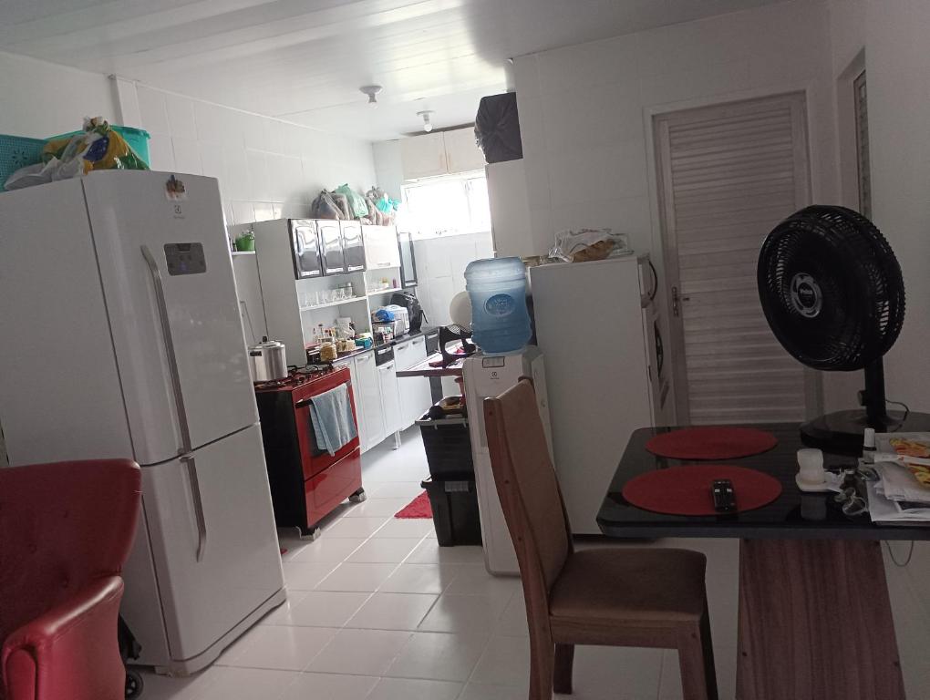 Kuchyň nebo kuchyňský kout v ubytování Hospedagem Nininha