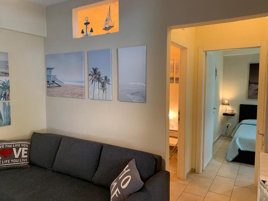 En eller flere senge i et værelse på Gardenia Guest House