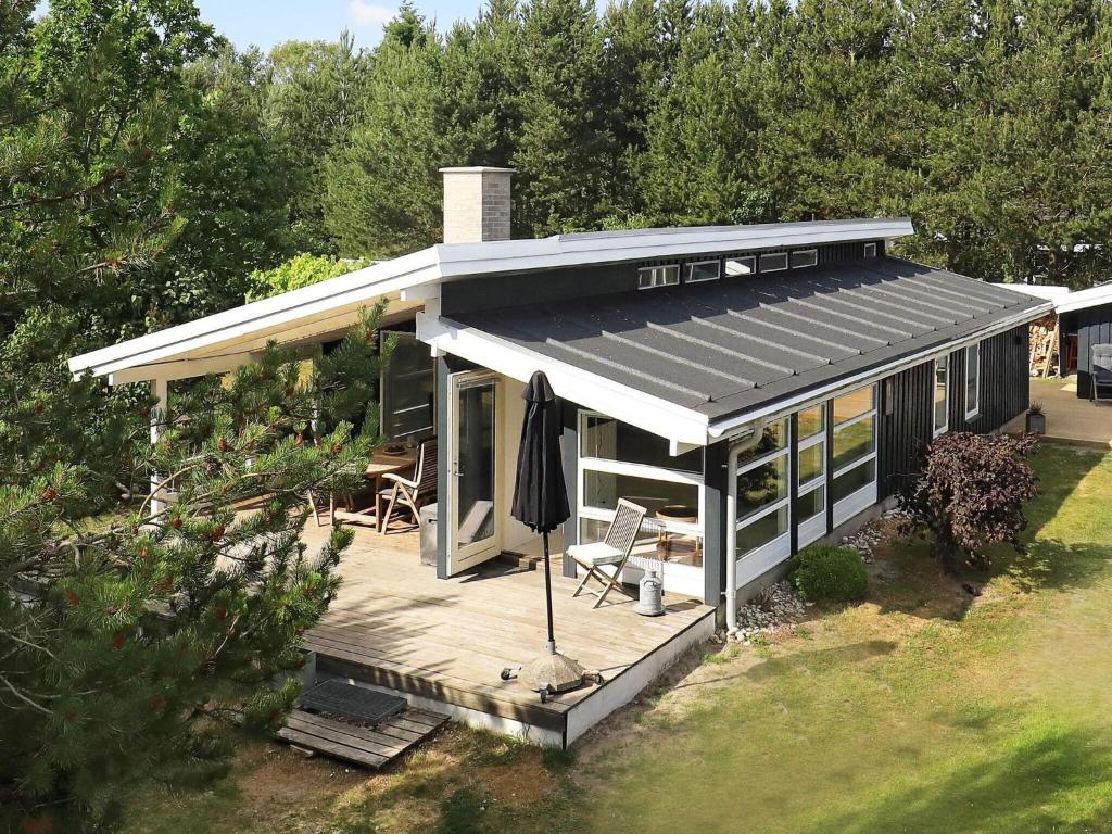 an overhead view of a house with a deck at 8 person holiday home in Hals in Hals