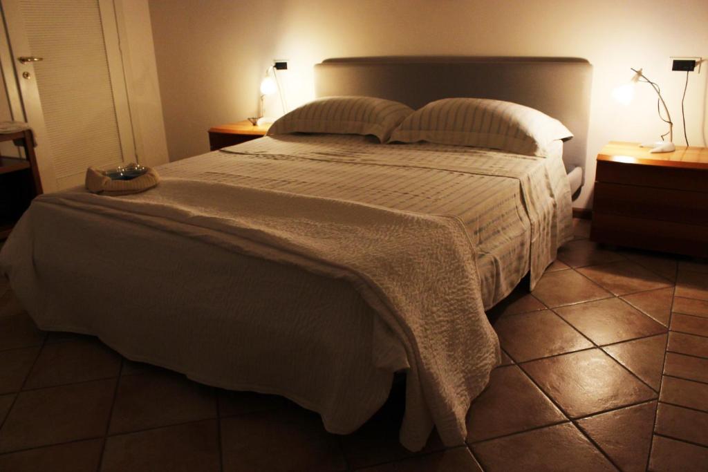 Postel nebo postele na pokoji v ubytování Roxy House