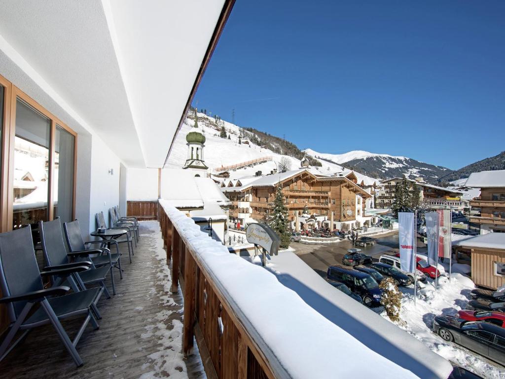 a balcony with chairs and a view of a mountain at Apartment in Gerlos near Ski Slopes in Gerlos