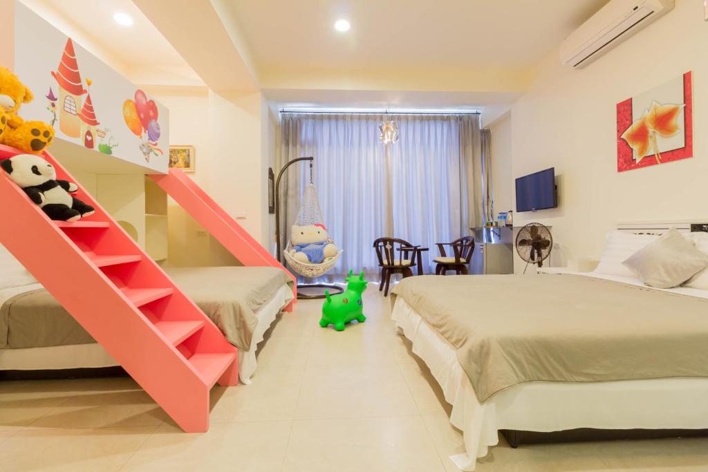 Postel nebo postele na pokoji v ubytování Flower B & B