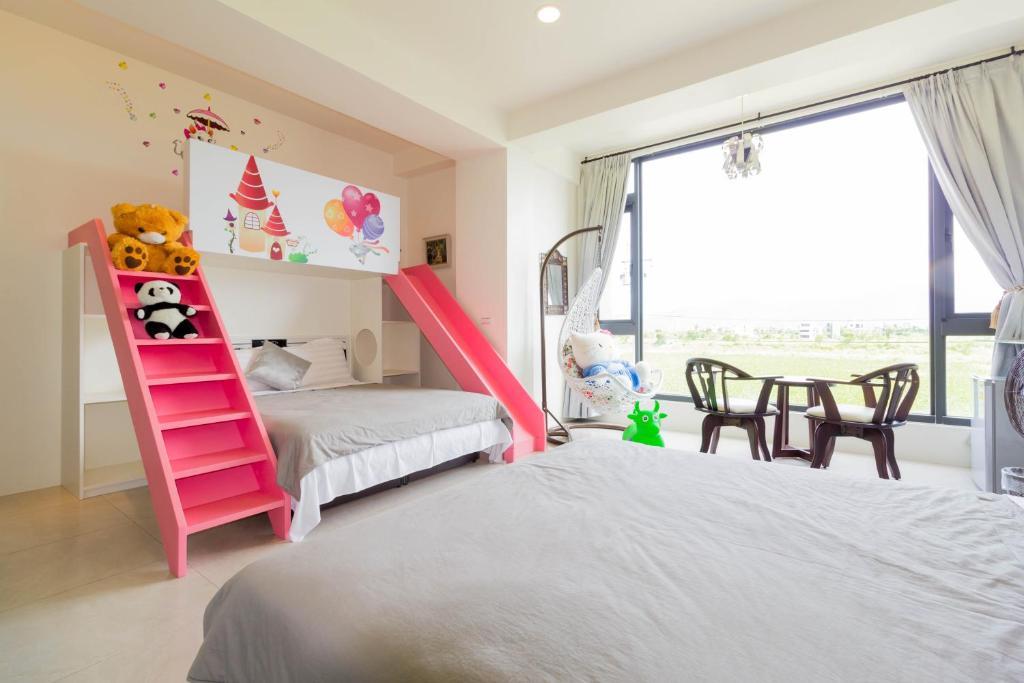 Postel nebo postele na pokoji v ubytování Flower B & B