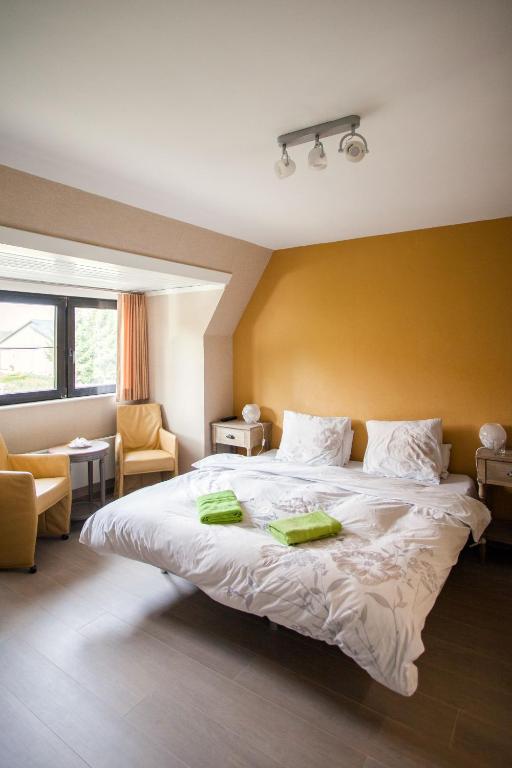 Postel nebo postele na pokoji v ubytování B&B 't Solveldje