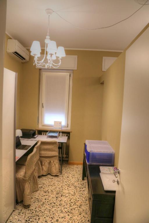 Postel nebo postele na pokoji v ubytování La Casetta di Lina Rooms and Apartments