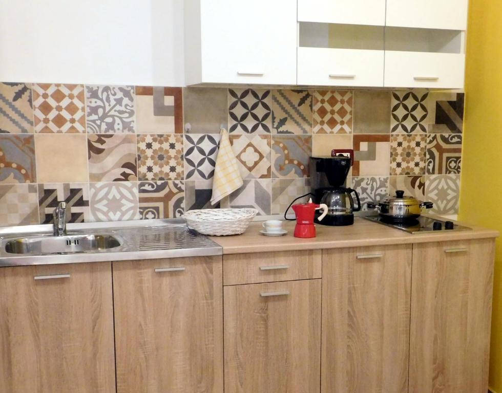 Kuchyň nebo kuchyňský kout v ubytování Central Apartments Circolo