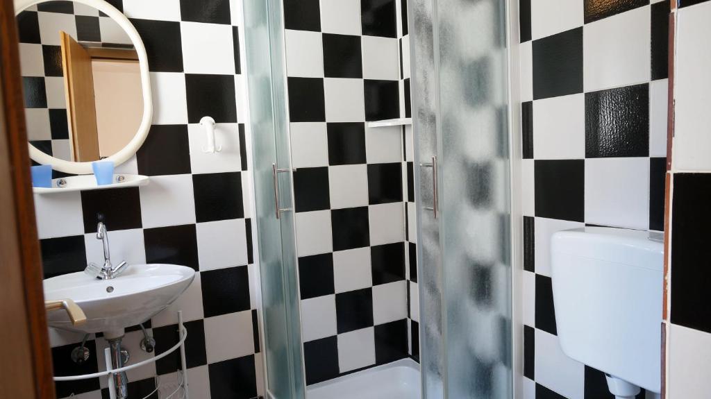 Koupelna v ubytování Guesthouse Garni