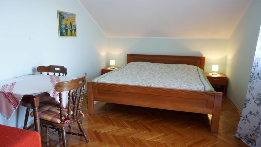 Postel nebo postele na pokoji v ubytování Guesthouse Garni