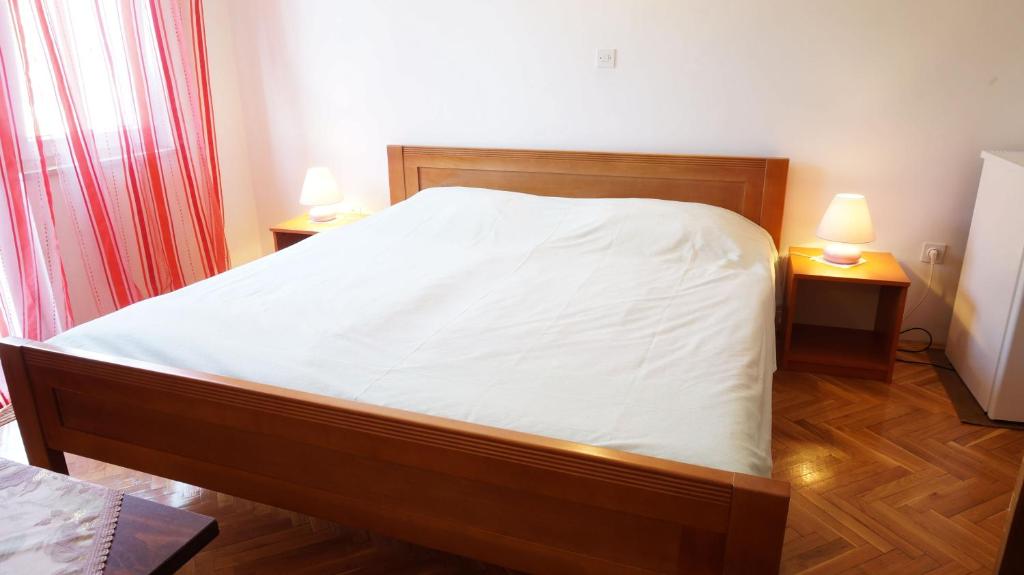 Postel nebo postele na pokoji v ubytování Guesthouse Garni