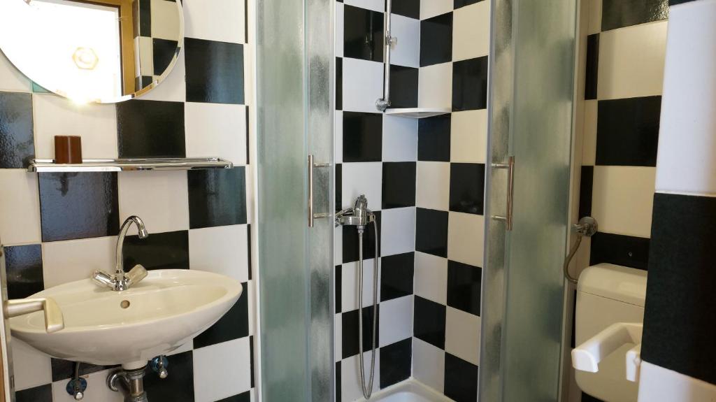 Koupelna v ubytování Guesthouse Garni