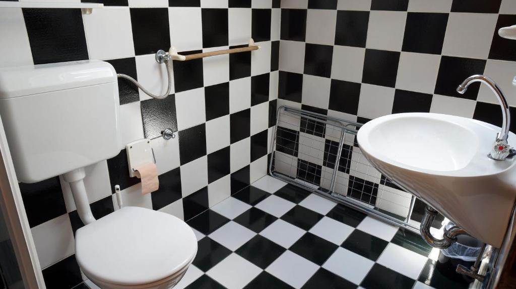 Koupelna v ubytování Guesthouse Garni