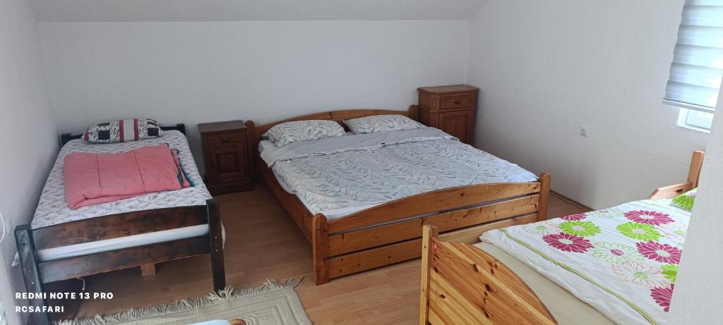 Postel nebo postele na pokoji v ubytování Holiday home una
