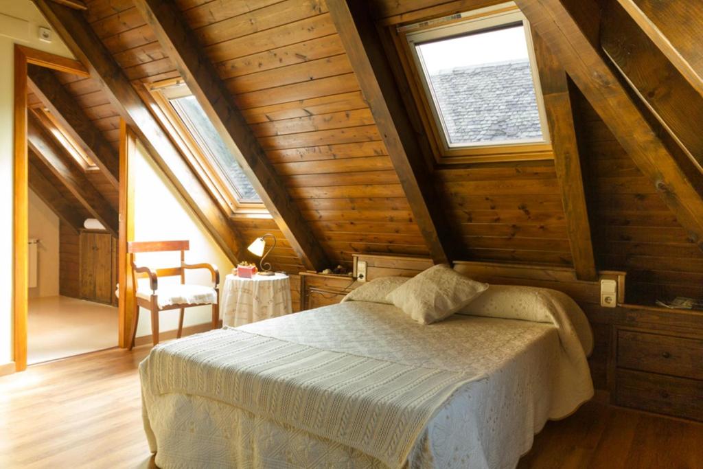 Voodi või voodid majutusasutuse Hostal Aiguamog toas
